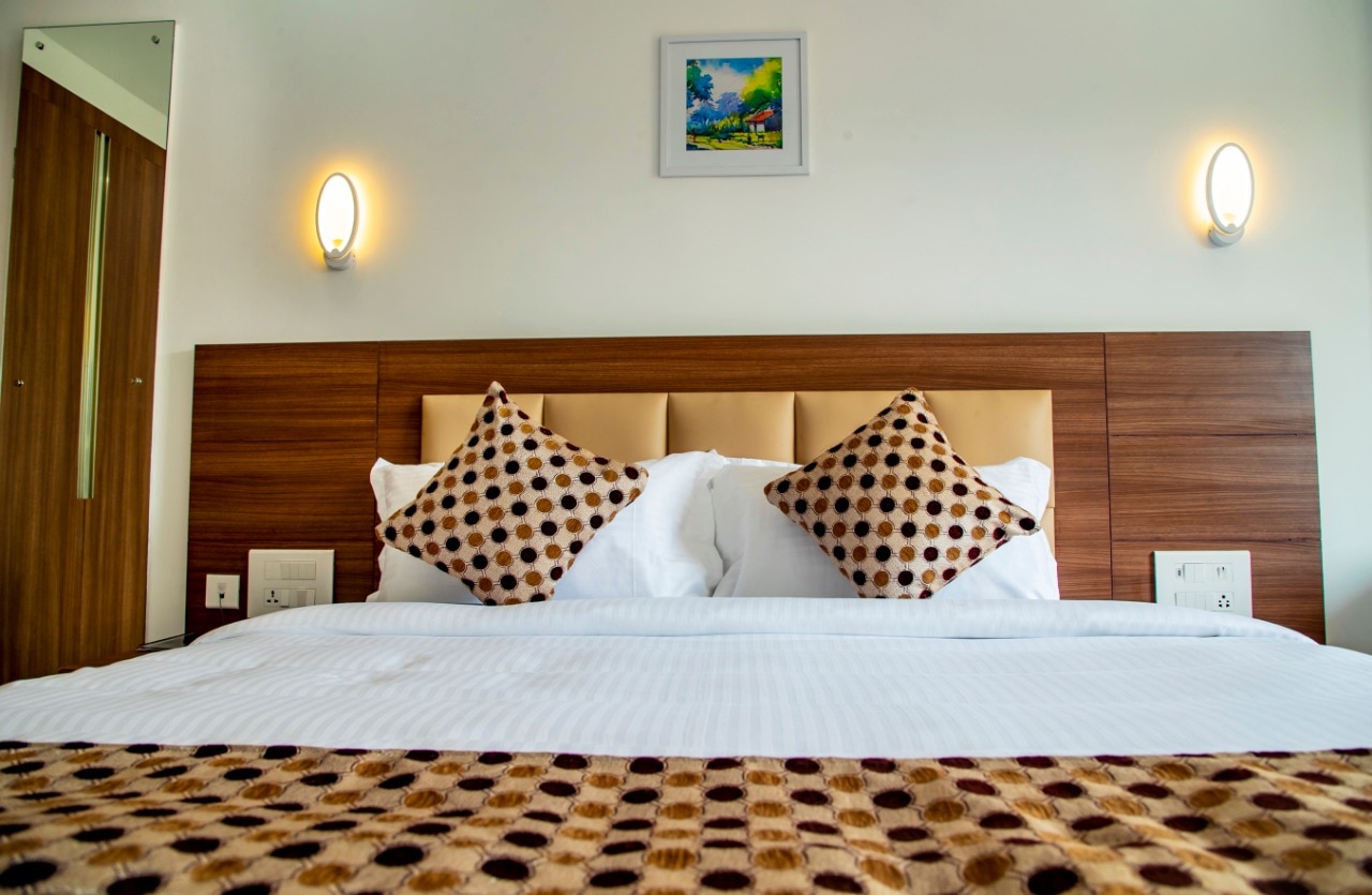 Premium Double Bed in Thrissur Accommodation